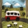 Close up of Knitted Campervan Mittens with Sheep, Trees and Clouds